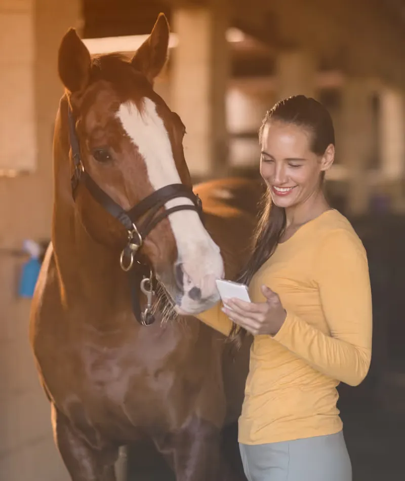 EC Pro equestrian barn management software — rider with horse